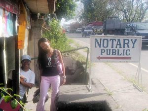 women-with-notary-signboard