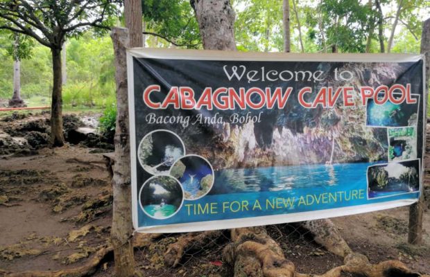 the-cave-signboard-on-the way
