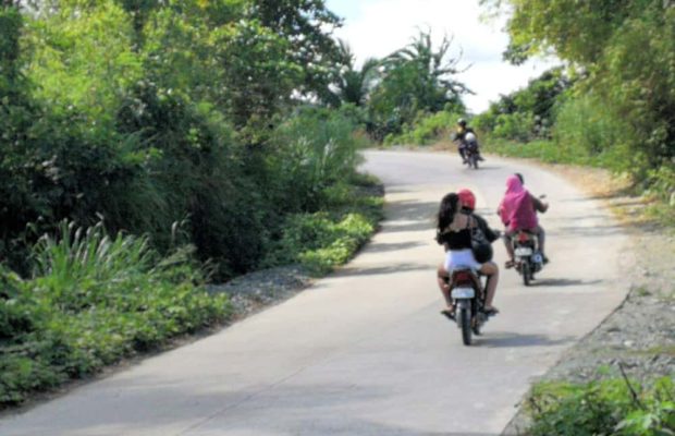 bikeride-uphill-on-concrete-road